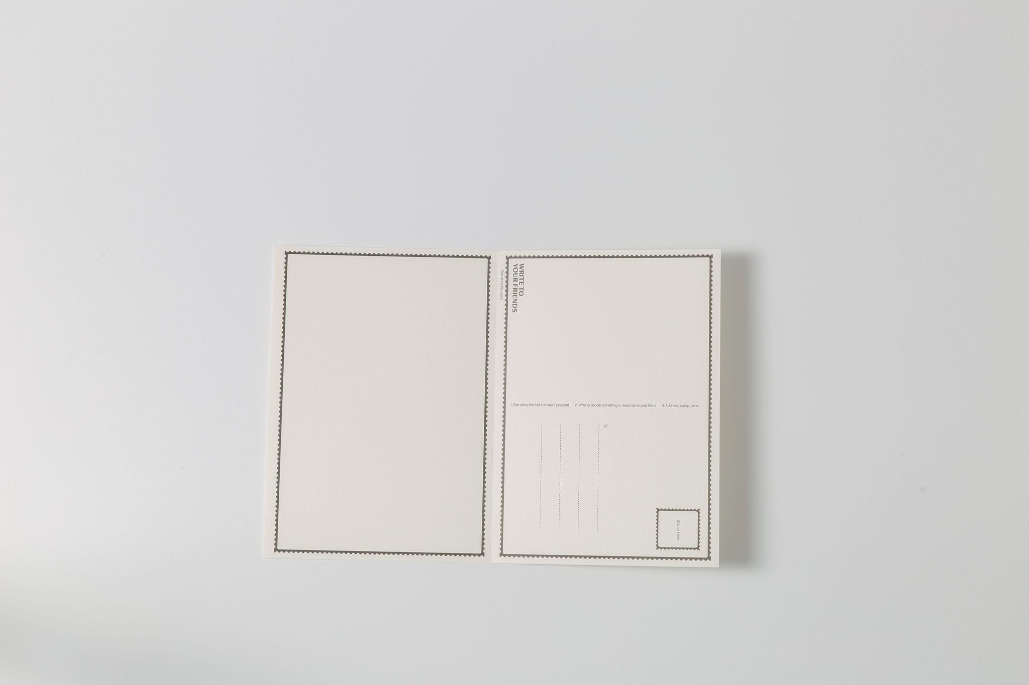 Open W2YF card showing the perforated reply postcard built into the back panel